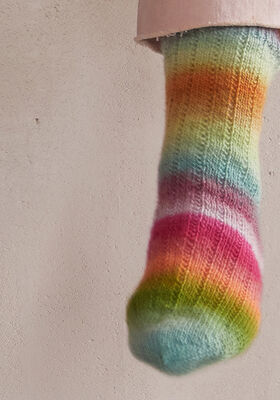 BAS-SOCKOR Meilenweit 100g Color Mix Multi - Stickmönster (SE) från Lana Grossa